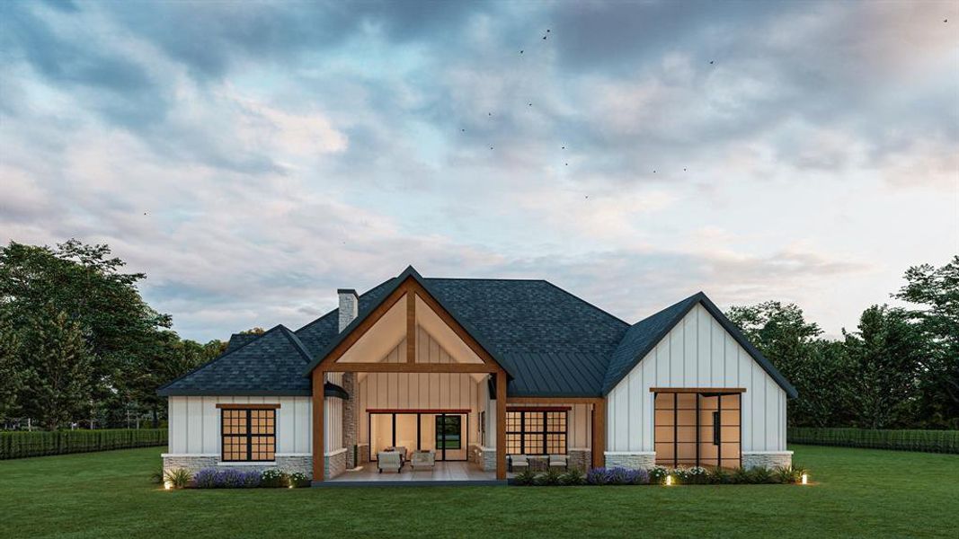 Rear view of property featuring a patio area and a lawn