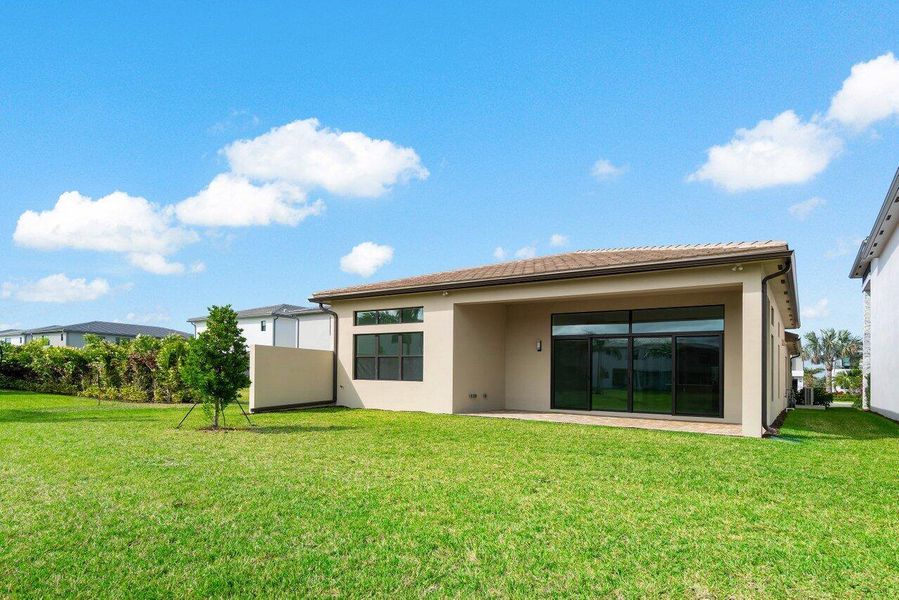 Exterior details and patio area of a home in Lotus Edge, Boca Raton (Image 4). Exterior details and patio area of a home in Lotus Edge, Boca Raton (Image 4).