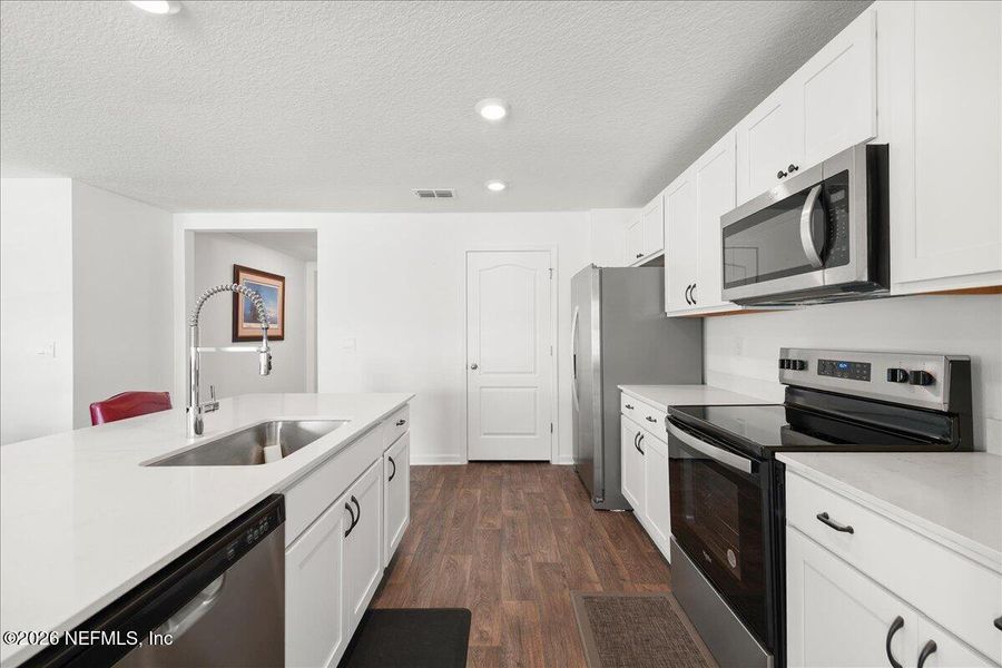 Furnished interior view inside a new home in , Green Cove Springs (Image 14).