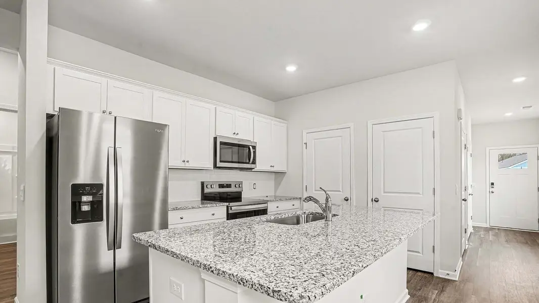 Furnished interior view inside a new home in Southshore Bay, Sunset Beach (Image 4).
