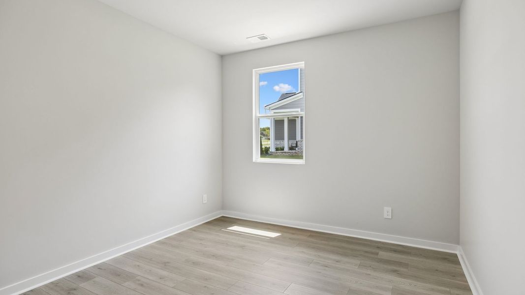 Representative unfurnished interior of a home built from the Ansley by D.R. Horton in Harvest Point, Spring Hill (Image 66).
