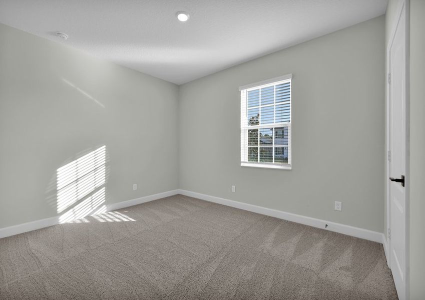 Each bedroom includes carpets, closets and bright windows