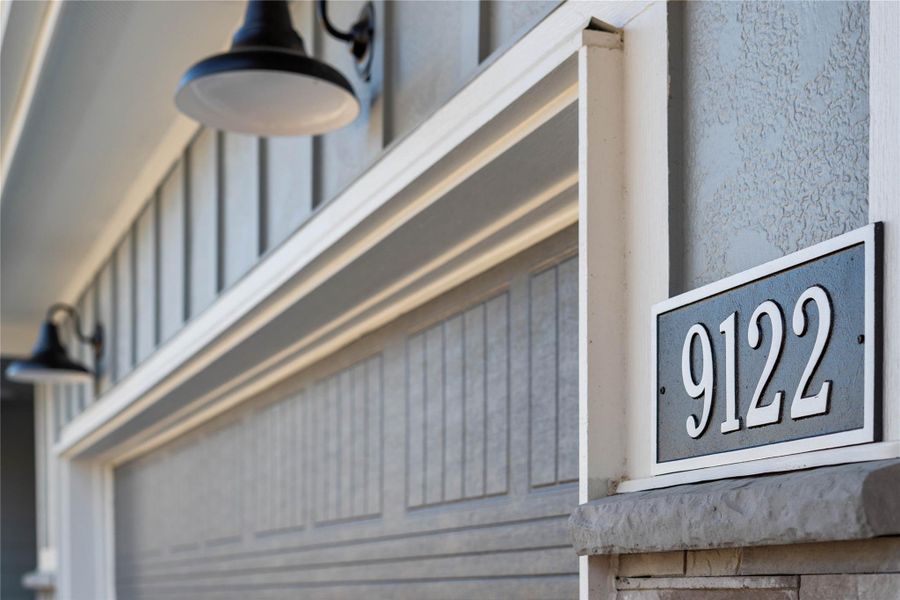 The property features stylish matte black gooseneck barn lights - providing ample illumination for safety and ambiance.