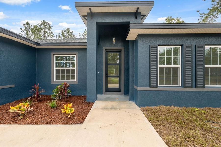 Exterior details and patio area of a home in , Ocala (Image 17).