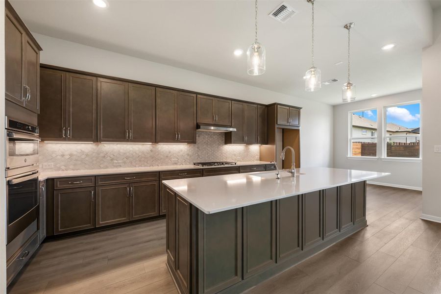 Furnished interior view inside a new home in The Trails at Carmel, Pflugerville (Image 7).