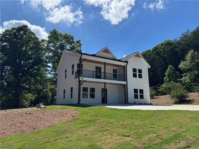 Front exterior of a new home in , Gainesville, GA, highlighting curb appeal (Image 2). Front exterior of a new home in , Gainesville, GA, highlighting curb appeal (Image 2).