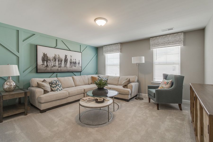Representative furnished interior of a home built from the Yates - Vanguard Collection by Mungo Homes in Georgias Landing, Raleigh (Image 9).