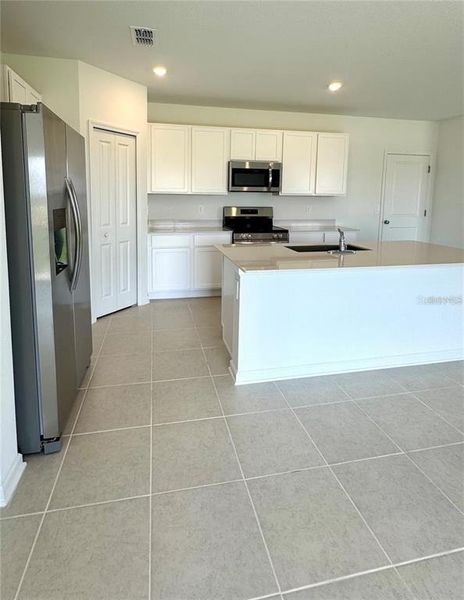Furnished interior view inside a new home in Hunt Club Groves: Manor Key Collection, Lake Wales (Image 7).