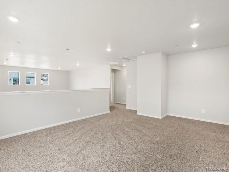 Spacious, unfurnished interior of a new home in Buffalo Highlands: The Flora Collection, Commerce City (Image 24).