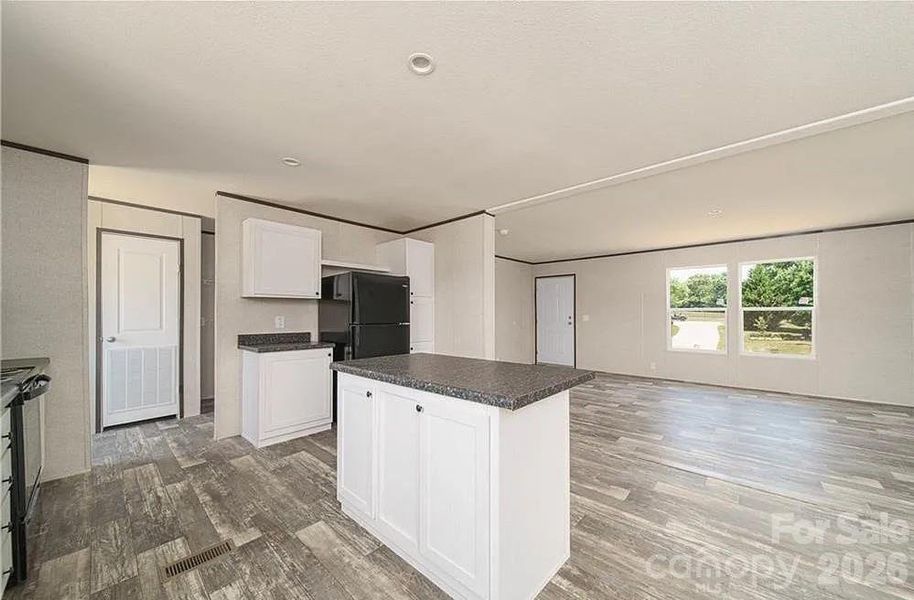 Furnished interior view inside a new home in , Lenoir (Image 4).