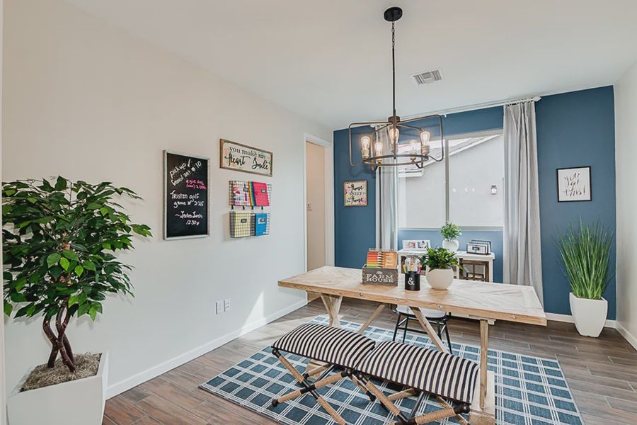 Representative furnished interior of a home built from the 3102 by Elliott Homes in Las Barrancas, Yuma (Image 10).
