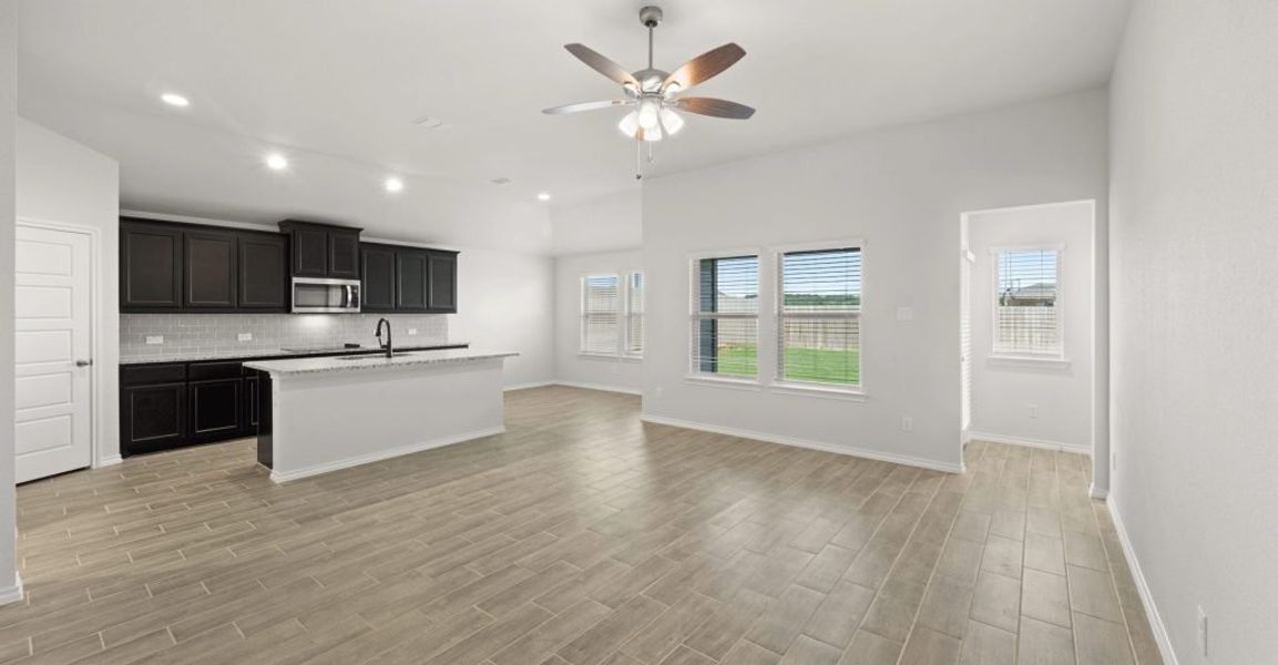 Representative exterior photo of a completed home built from the Pembridge II by Impression Homes in Mountain Valley, Burleson, TX (Image 10). Representative exterior photo of a completed home built from the Pembridge II by Impression Homes in Mountain Valley, Burleson, TX (Image 10).