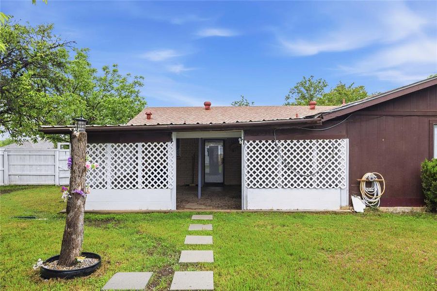Exterior details and patio area of a home in , Brownwood (Image 22).