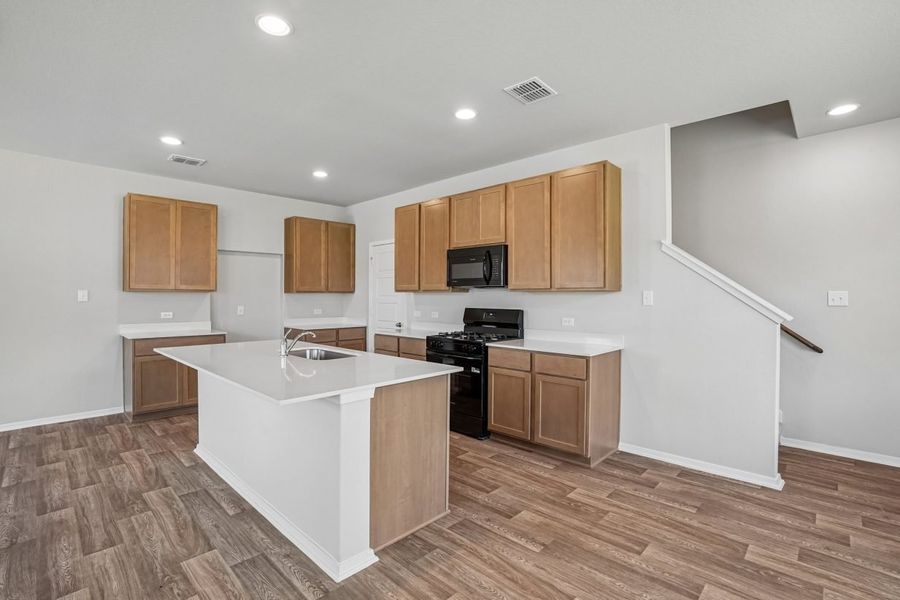 Furnished interior view inside a new home in Hunters Ranch, San Antonio (Image 7).