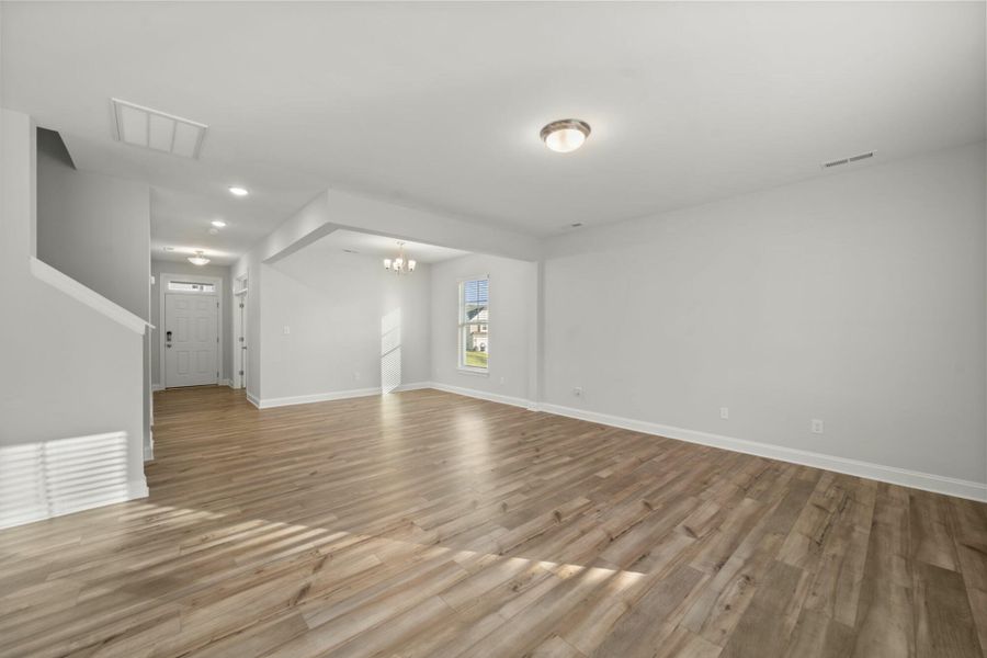 Spacious, unfurnished interior of a new home in Cottages at Piper Village, Trinity (Image 22).