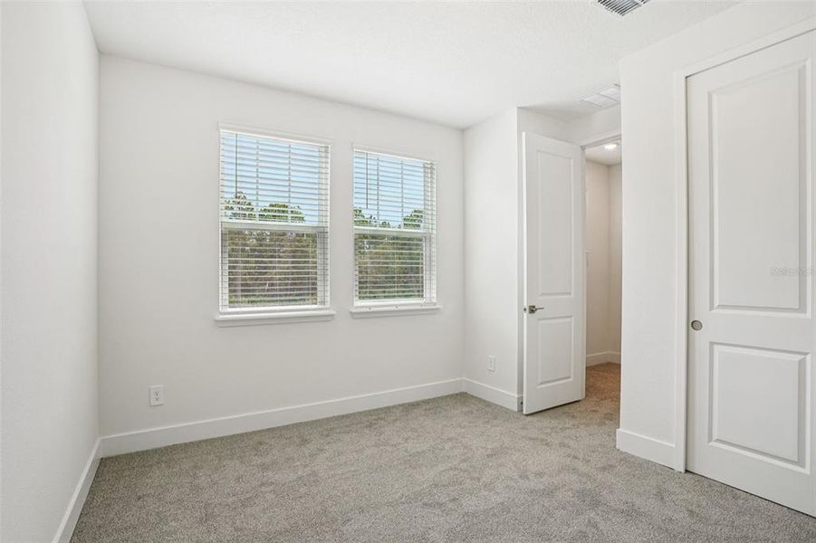 Spacious, unfurnished interior of a new home in Ridgehaven - Signature Series, Ormond Beach (Image 37).