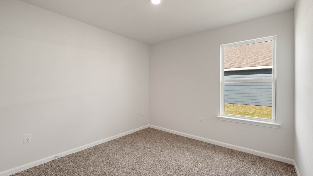 Spacious, unfurnished interior of a new home in Magnolia at the Bluffs Phase 3, Freeport (Image 17).