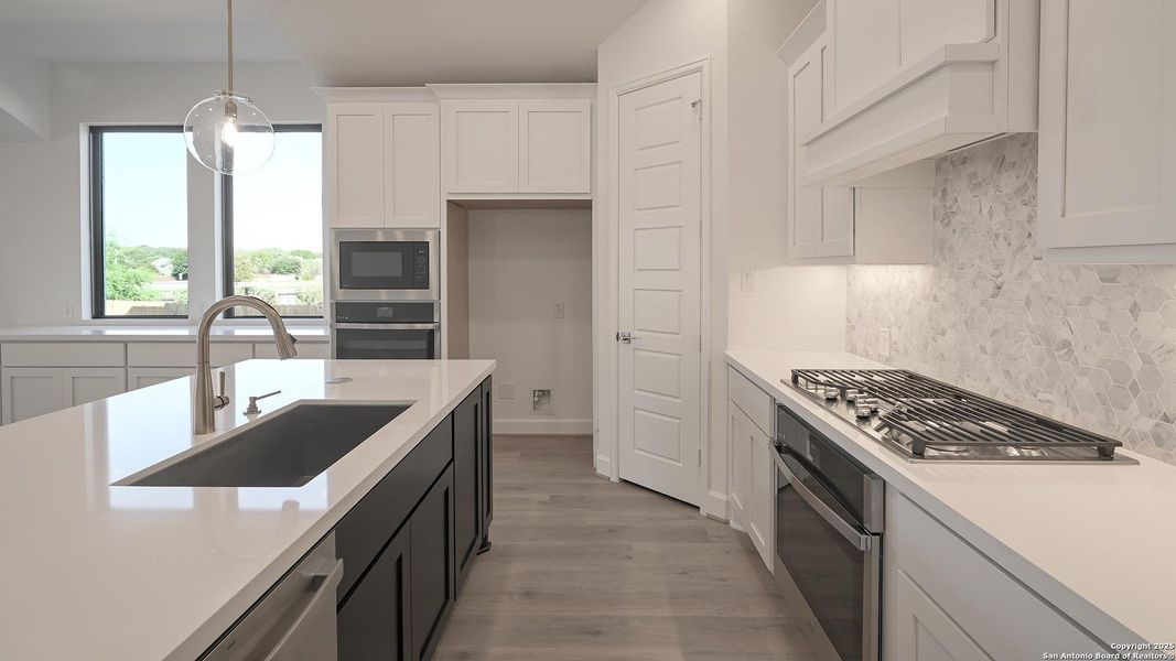 Furnished interior view inside a new home in Cibolo Valley Heights 65', Cibolo (Image 8).