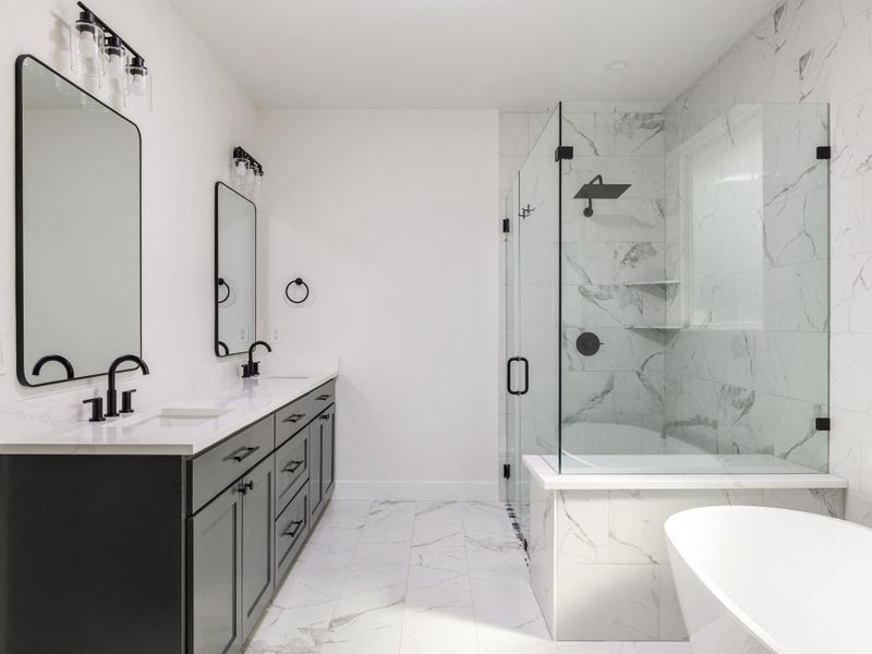 Primary Bathroom with double vanity, oversized walk in shower, and separate bathtub Primary Bathroom with double vanity, oversized walk in shower, and separate bathtub