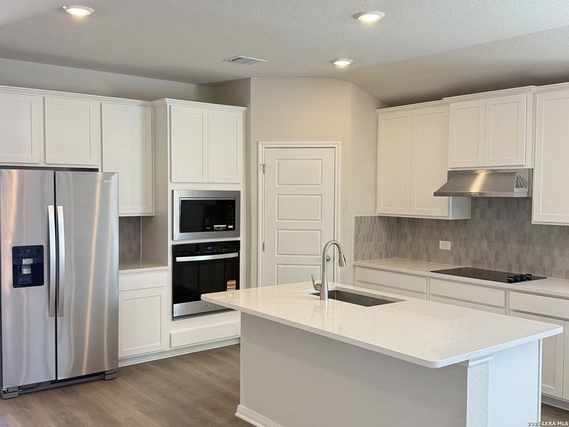 Furnished interior view inside a new home in Legendary Trails - Classic Series, Cibolo (Image 9). Furnished interior view inside a new home in Legendary Trails - Classic Series, Cibolo (Image 9).