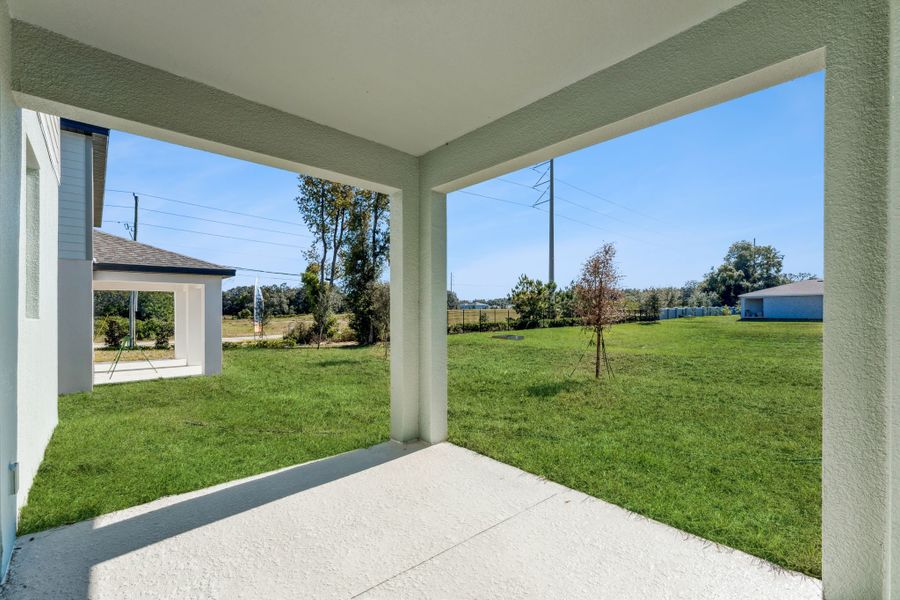 Exterior details and patio area of a home in Estes Reserve, Eustis (Image 25).