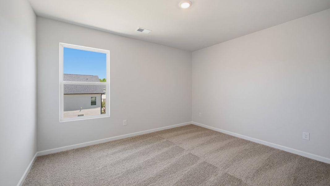 Spacious, unfurnished interior of a new home in Shoal Creek, Hampton (Image 21).