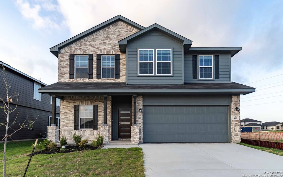 Front exterior of a new home in Hannah Heights, Seguin, TX, highlighting curb appeal (Image 17).