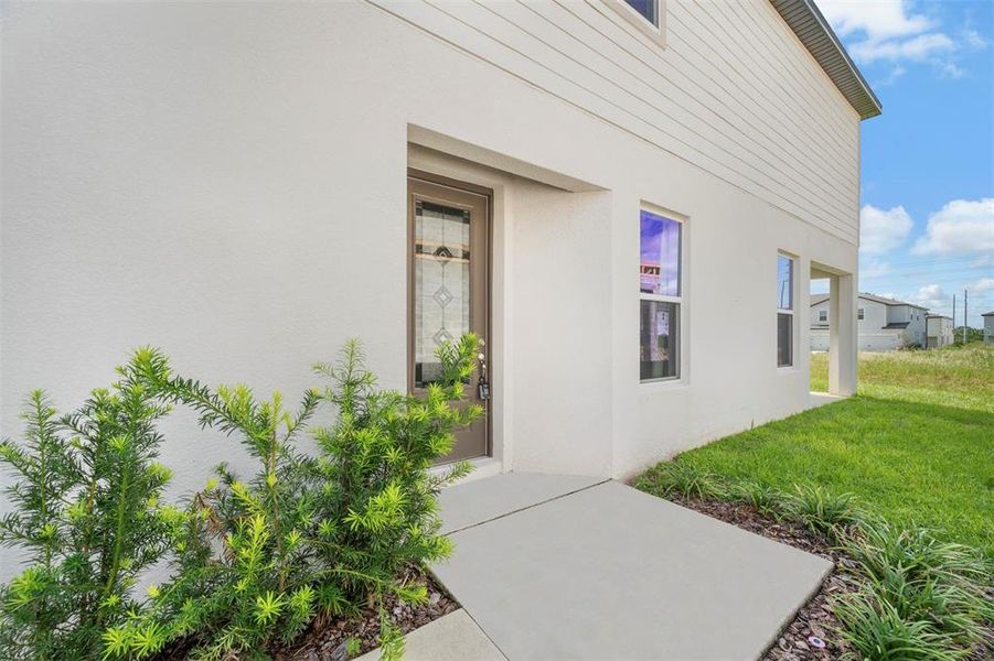 Exterior details and patio area of a home in Sol Vista, Dundee (Image 4). Exterior details and patio area of a home in Sol Vista, Dundee (Image 4).