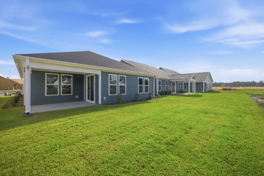 Exterior details and patio area of a home in Terrapin, Leland (Image 16).