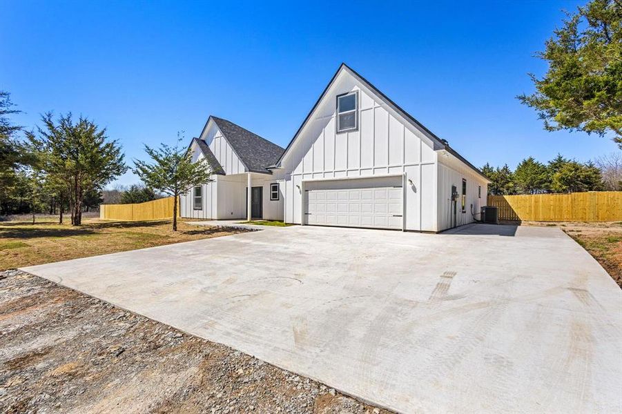 Front exterior of a new home in , Petty, TX, highlighting curb appeal (Image 2). Front exterior of a new home in , Petty, TX, highlighting curb appeal (Image 2).