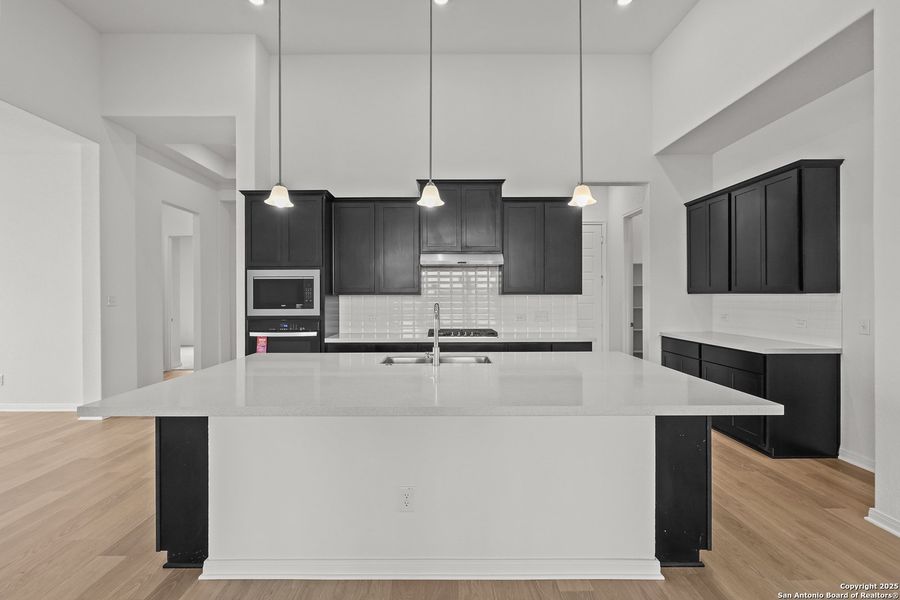 Furnished interior view inside a new home in Homestead 75', Schertz (Image 12).