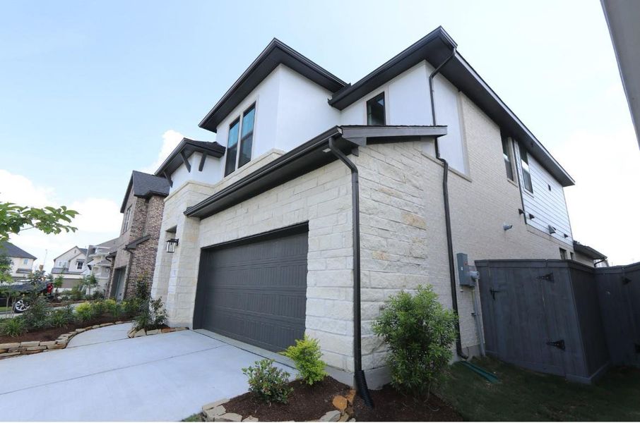 Front exterior of a new home in , Hockley, TX, highlighting curb appeal (Image 2). Front exterior of a new home in , Hockley, TX, highlighting curb appeal (Image 2).