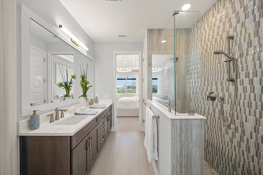 Representative furnished interior of a home built from the Mooring by Homes by Towne in Shellstone at Waterside, Sarasota (Image 13). Representative furnished interior of a home built from the Mooring by Homes by Towne in Shellstone at Waterside, Sarasota (Image 13).