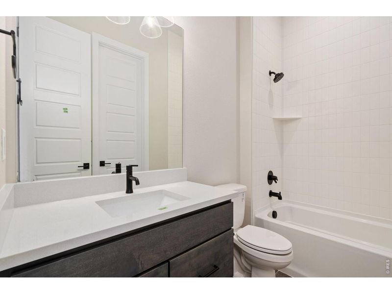 Furnished interior view inside a new home in The Fairways at RainDance, Windsor (Image 7).