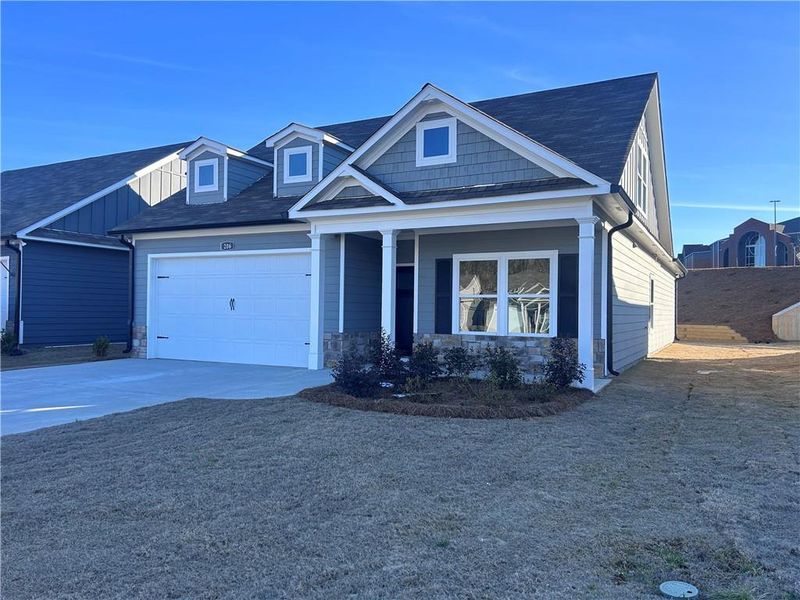 Front exterior of a new home in , Cartersville, GA, highlighting curb appeal (Image 27).