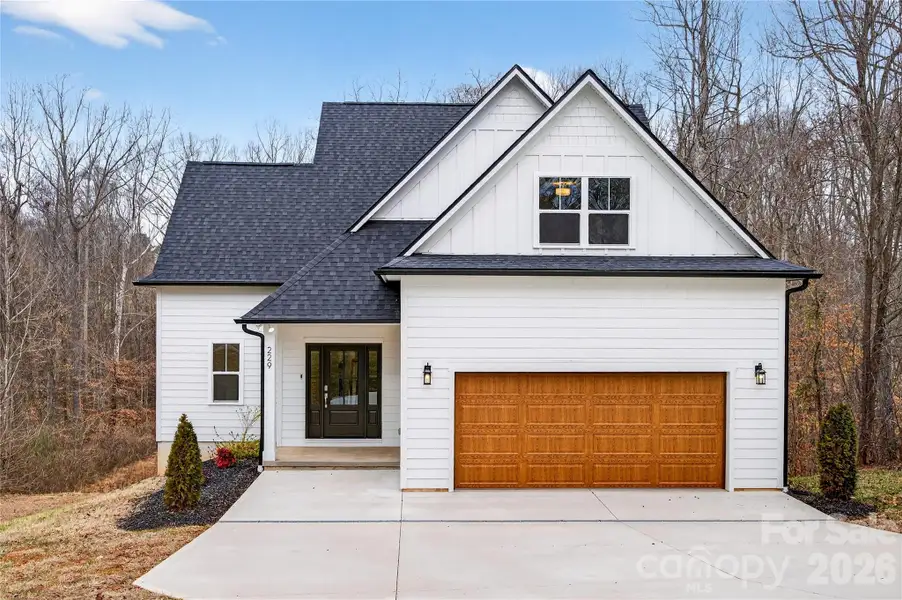 Front exterior of a new home in , Troutman, NC, highlighting curb appeal (Image 2). Front exterior of a new home in , Troutman, NC, highlighting curb appeal (Image 2).