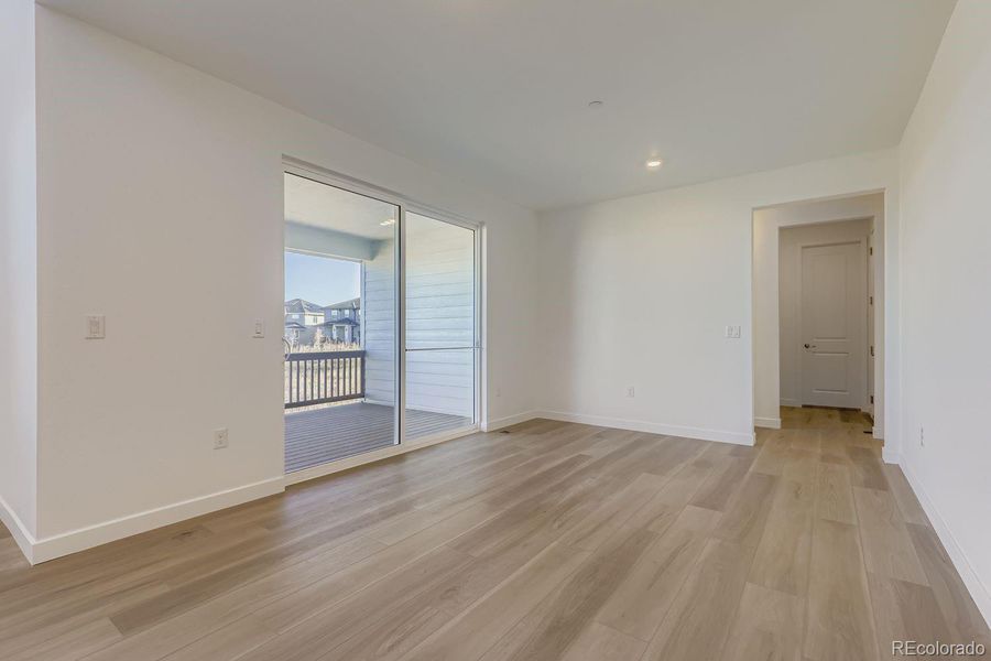 Spacious, unfurnished interior of a new home in Sunset Village: The Grand Collection, Erie (Image 7).