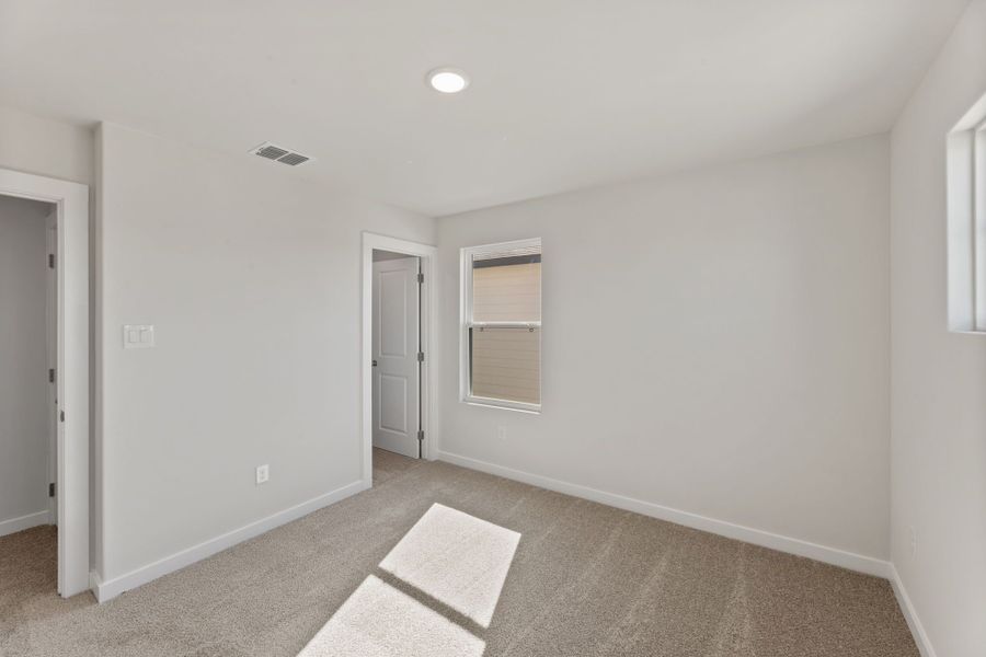 Representative unfurnished interior of a home built from the Poinseta by Hakes Brothers in Hickory Ridge, Elmendorf (Image 17). Representative unfurnished interior of a home built from the Poinseta by Hakes Brothers in Hickory Ridge, Elmendorf (Image 17).