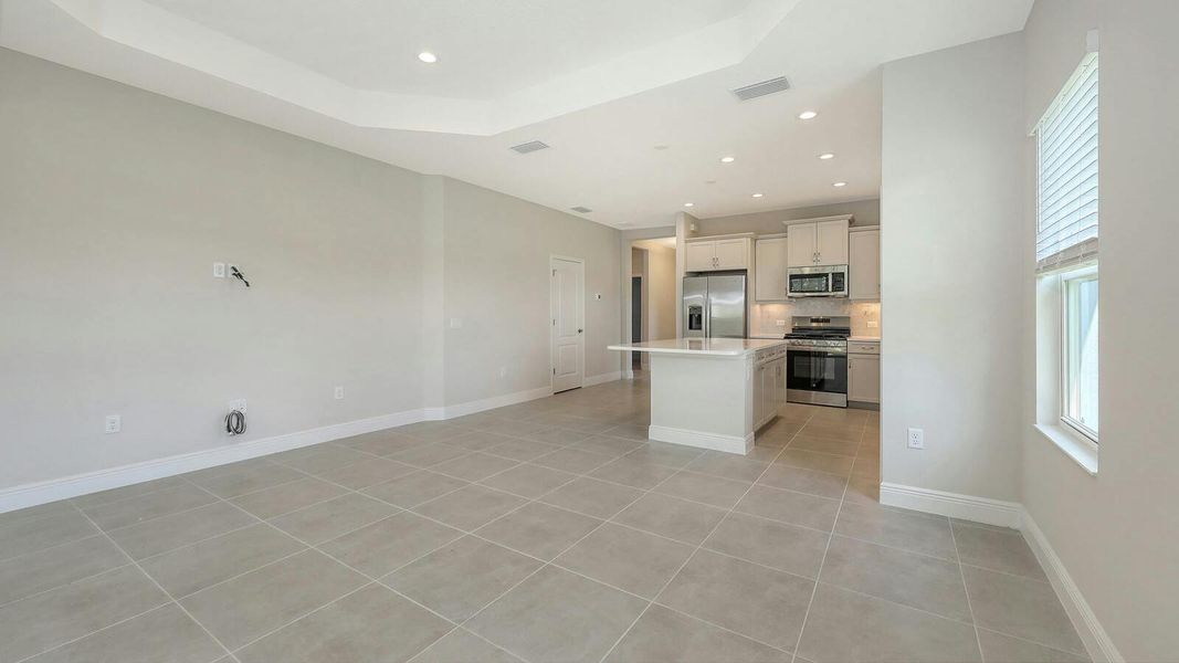 Spacious, unfurnished interior of a new home in Wildleaf Real Estate and Homes for Sale in Parrish, FL - Neal Communities, Parrish (Image 41). Spacious, unfurnished interior of a new home in Wildleaf Real Estate and Homes for Sale in Parrish, FL - Neal Communities, Parrish (Image 41).