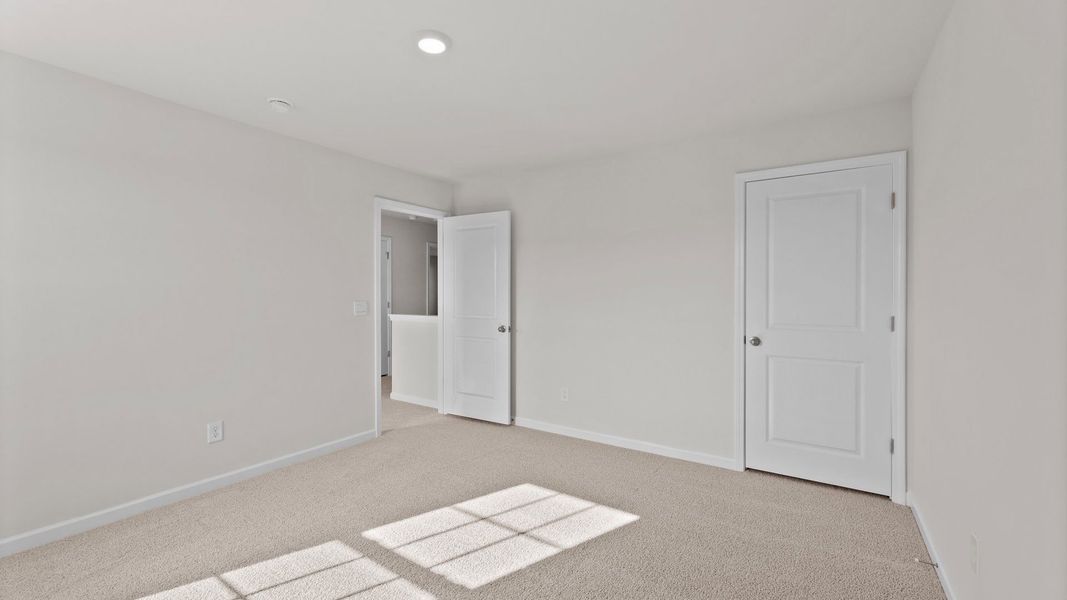 Spacious, unfurnished interior of a new home in Ridgewood Farms, Winterville (Image 17).