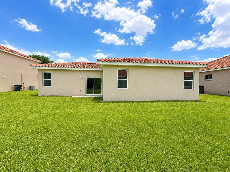 Exterior details and patio area of a home in , Kissimmee (Image 3).