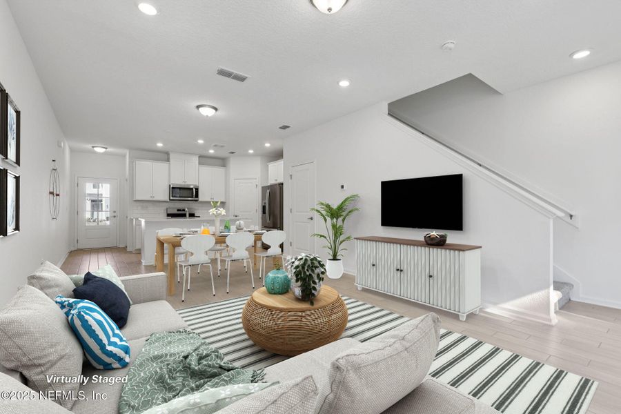 Furnished interior view inside a new home in Brandon Lakes at Silver Landing, St. Augustine (Image 7).