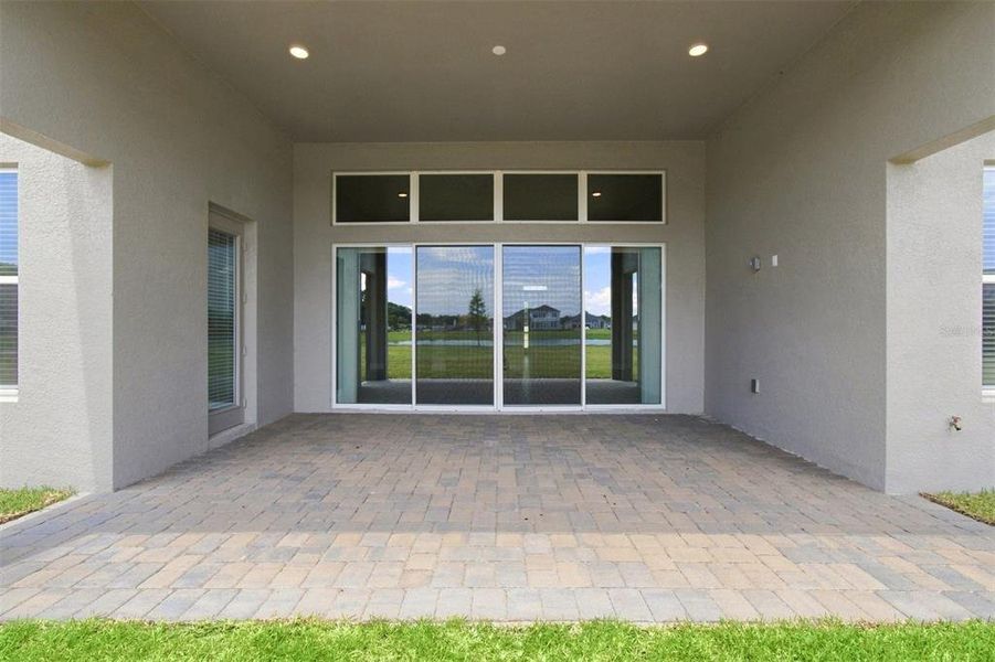 Exterior details and patio area of a home in Solace at Corner Lake, Orlando (Image 4).