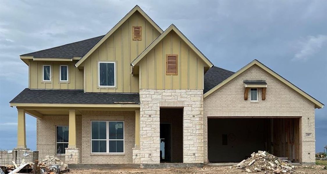 Front exterior of a new home in Callan Village, Lorena, TX, highlighting curb appeal (Image 1).