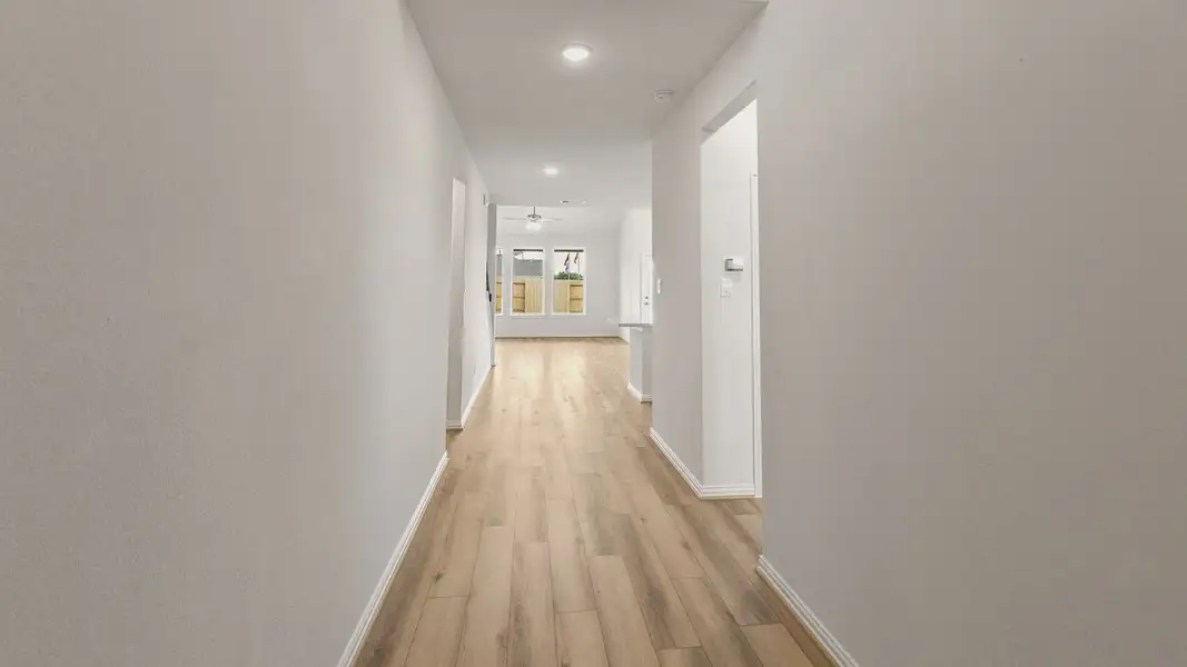 Furnished interior view inside a new home in Azalea, Pattison (Image 4).