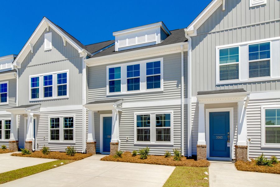 Front exterior of a new home in Astoria, Columbia, SC, highlighting curb appeal (Image 17).