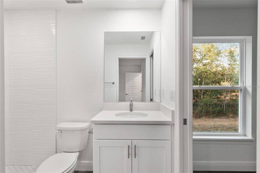 Furnished interior view inside a new home in , Dunnellon (Image 14).