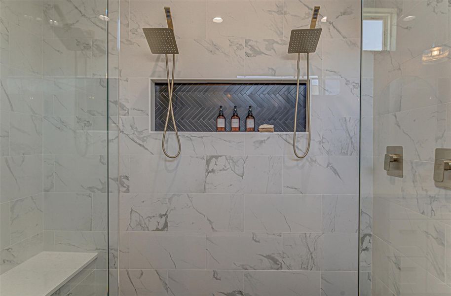 Bathroom with dual shower heads.