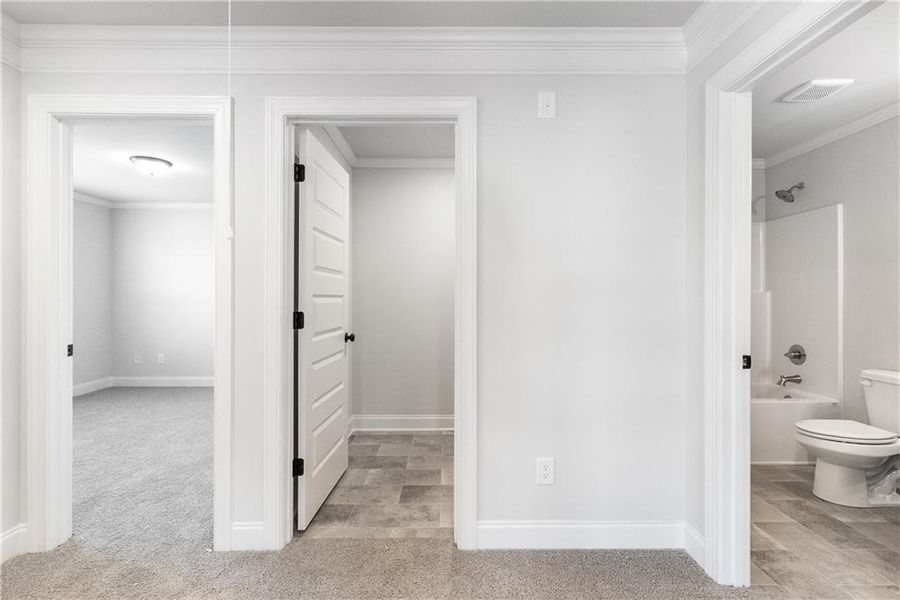 Spacious, unfurnished interior of a new home in Calgary Downs, Winder (Image 30).