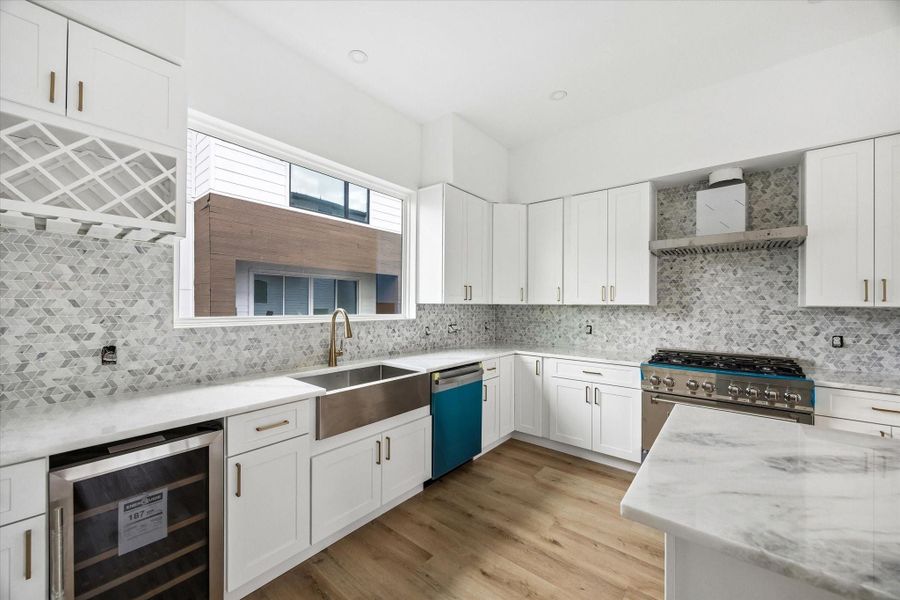 The kitchen offers ample counter space, perfect for preparing your favorite meals with ease.